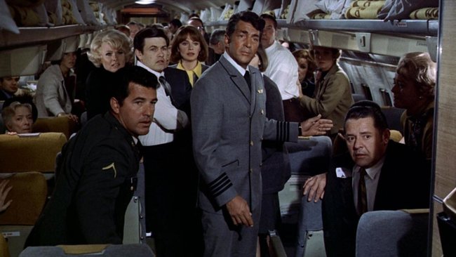Vernon Demerest (Dean Martin) kümmert sich um die Fluggäste.