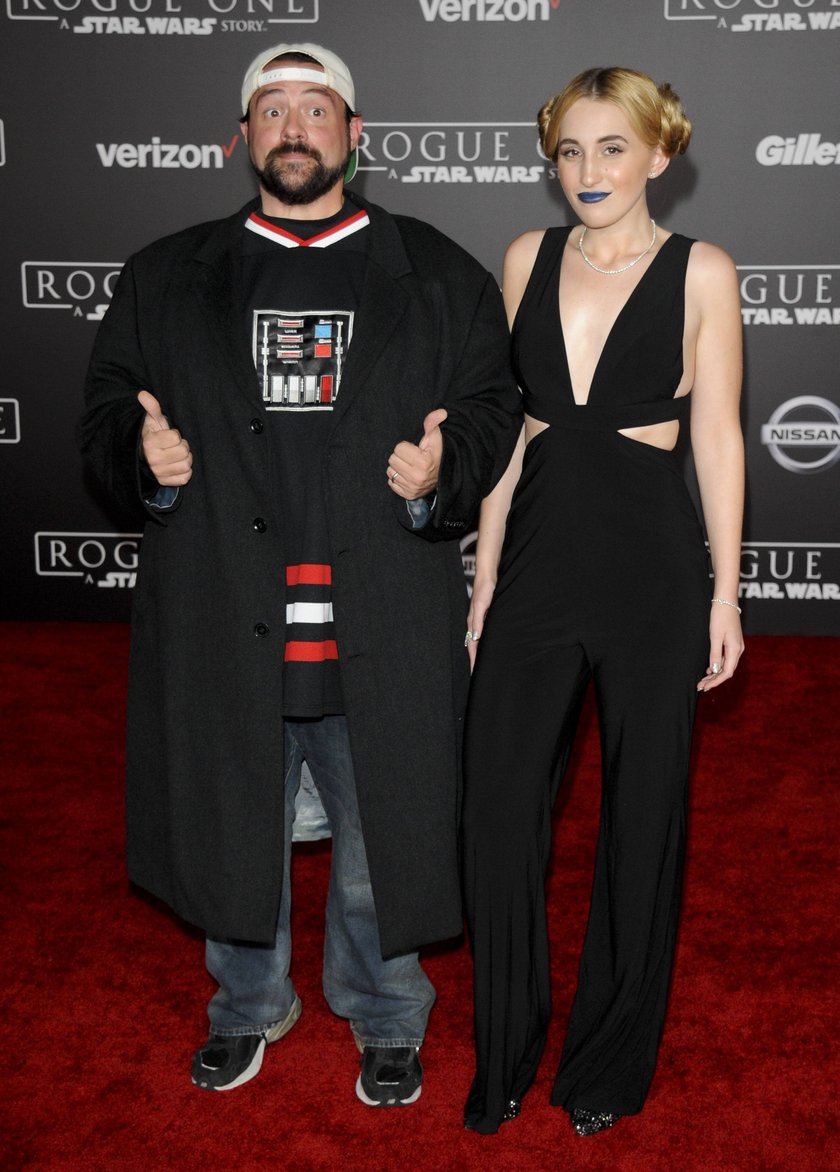 Kevin Smith & daughter Harley Quinn Smith ROGUE ONE: A STAR WARS STORY FILM PREMIERE Hollywood Patrick Rideaux/PicturePerfect

Kevin Smith & Daughter Harley Quinn Smith Rogue One a Star Wars Story Film Premiere Hollywood Patrick Rideaux Picture Perfect  