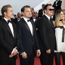 Once Upon a Time in... Hollywood / Margot Robbie, Quentin Tarantino, Leonardo DiCaprio and Brad Pitt at the premiere red carpet for "Once Upon A Time In Hollywood" during the 72nd Cannes Film Festival at the Palais des Festivals on May 21, 2019 in Ca Poster